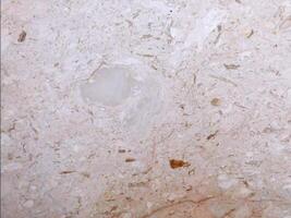 A close up of a white marble surface with a hole in it video