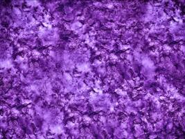 A purple and white fabric with a large amount of water on it video