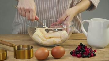 Pastry chef uses fork to transform raw banana into a smooth banana puree, which is then used to create delicious sweet pastries. video