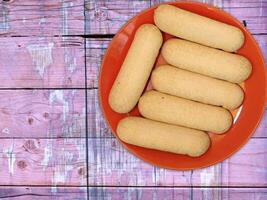 A plate of bread sticks on a wooden table video