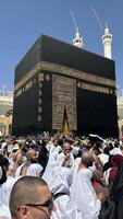 MECCA, SAUDI ARABIA - MAY 02 2024. View on Kaaba from second floor of Masjid Al Haram through some new constructions building around the masjid. High quality photo
