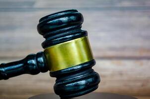 Close up view of lawyer gavel with customizable space for text, message or ideas. Law and copy space concept photo