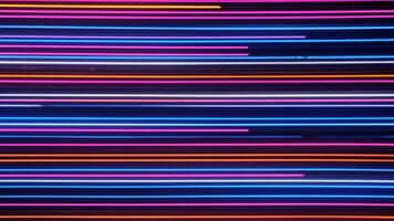 Dynamic abstract background with neon light lines in vibrant colors on a dark surface video