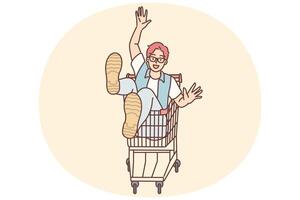 Cheerful man rides sitting in cart and supermarket after shopping and buying goods in store vector