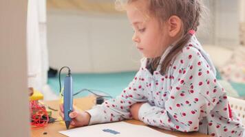 Girl using 3D pen to create Ukraine flag at home video