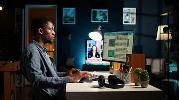 Operating from home setup, male freelancer evaluating monetary data and searching international capital funds sources to help expand the business. Fiscal analyst validates budget balance. Camera A. video