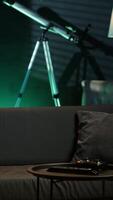 Vertical Cheerful gamer rushing home to play newly released game. Happy man jumping on couch, eager to play videogame on console, relaxing after hard day at work, camera A slow motion shot video