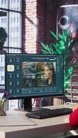 Vertical Software developer at home office coding on desktop using AI powered script, building an interface and implementing programming language algorithms. Engineer uses text to code. Camera B. video