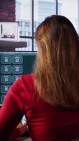 Vertical Online interaction with an AI chatbot system on a desktop setup, woman using technology evolution, virtual assistance and automated dialogue for data driven productivity and innovation. Camera B. video