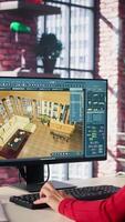 Vertical Woman at home creating a 3D render of an apartment interior layout, utilizing architectural software. Developer uses digital tools to decorate detailed home design, placing assets. Camera B. video