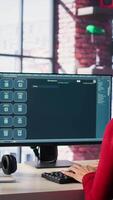 Vertical Woman interacting with intelligent AI chatbot next to mockup display, using innovative system. Machine learning enhances efficiency and communication through advanced algorithms. Camera B. video