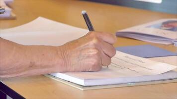 the signing of a business document contract or certificate video