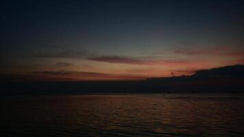 Beautiful twilight scene of the sea with colourful sky at Koh Samui. Tranquil scenery seascape in the dusk. video