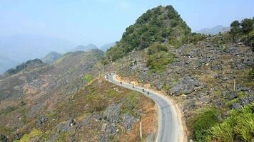 Aerial view of motorcycle tour riding on Ha Giang Loop in Vietnam. video