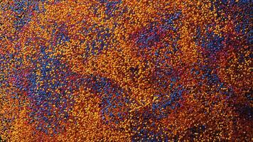 3d render of abstract particle flow animation with 3d small particle in orange, red, purple, and blue color video