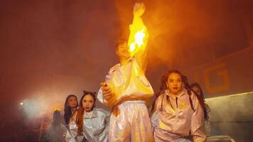 Dynamic Dance Performance with Orange Smoke video