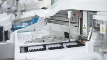 Modern laboratory with advanced equipment and an analyzer. The concept innovative technologies and top-notch equipment for precise scientific research video