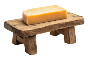 Rustic wooden table supporting a block of cheese png