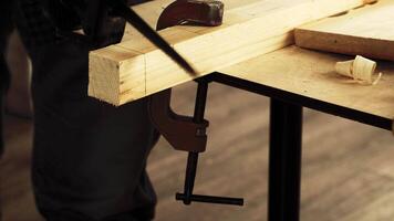 Woodwork craft project in workshop with hand tools during daytime video