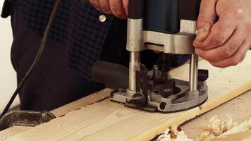 Crafting with precision tools while shaping wood in a workshop video
