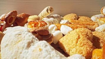 Explore a delightful array of freshly baked pastries and desserts in a local bakery video