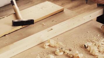 Crafting wooden projects with precision in a cozy workshop during daylight hours video