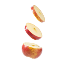 Three Slices of a Red Apple Falling Against a Black Background png
