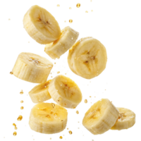 Flying Banana Slices with Juice Droplets Splashing on Black Background png