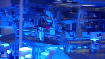 Automate machinary Close up of advanced automated manufacturing machine in action. The intricate automation mechanical components move precisely. Modern technology and high-tech industrial automation video