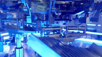 Automate machinary. Close up of advanced automated manufacturing machine in action. The intricate automation mechanical components move precisely. Modern technology and high tech industrial automation video