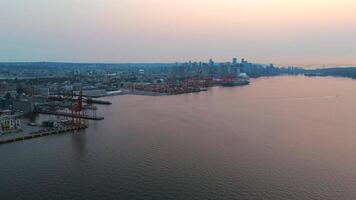 Aerial view of Port of Vancouver, harbour and mountains on the background video