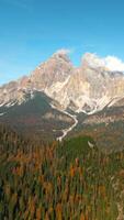 Aerial hyperlapse of high mountain peak with clouds in Dolomites, Italy video