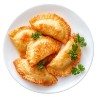 A plate of empanadas with parsley on it png