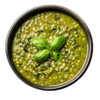 A bowl of green soup with a sprig of basil png