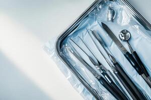 A tray with surgical tools in it photo
