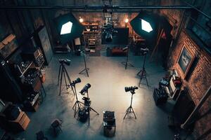 A room with several lights and cameras photo