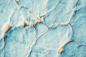 A close up of a blue marble surface with cracks photo