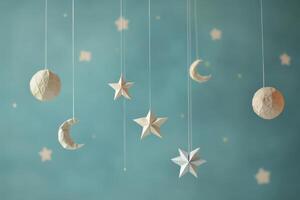 Celestial Mobile with Paper Stars Moons and Planets photo