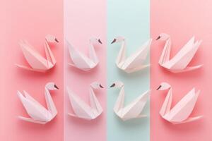 Eight Delicate Paper Origami Swans Arranged on Pastel Backgrounds photo