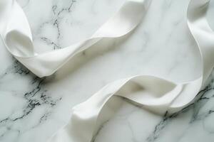 White Satin Ribbon on Marble Background photo