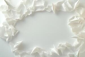 White Paper Airplanes Surround Crumpled Paper photo