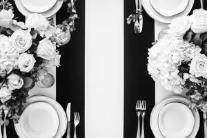 Elegant Black and White Table Setting with Flowers photo