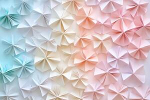 Pastel Paper Flowers Arranged In Gradient Pattern photo