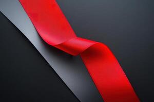 Red and grey ribbon on dark background photo