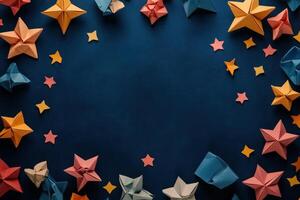 Colorful Origami Stars Arranged on a Dark Blue Background photo