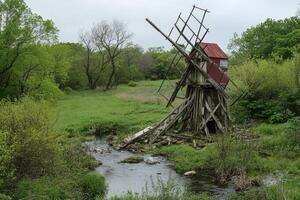 A windmill in the woods photo
