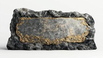 A large stone with a gold plaque on it photo