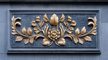 A decorative gold leaf on a building photo
