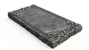 A black stone with ornate design on it photo
