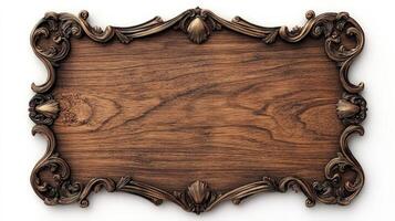 Wooden frame with ornate design on white background photo